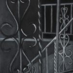 Closeup of wrought iron railing