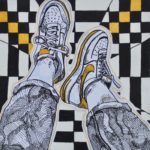 Sneakers outlined on checkered floor