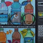 Painting of sports drinks inside a vending maching