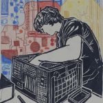 Teen fixing computer