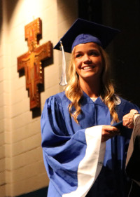 graduate with cross