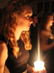 senior girl holding candle